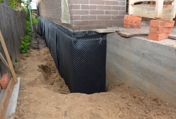 Happy homeowners after waterproofing job in West Jefferson